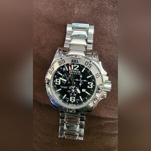 Mens Invicta Excursion Model #6108 Stainless Steel With a Black Face.